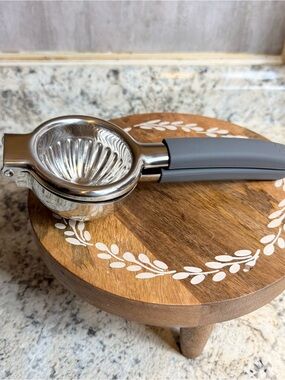 Princess House Stainless Citrus press with Gray Handles
